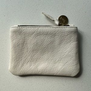 Clare V. white coin clutch
